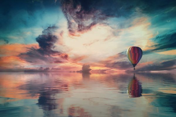Landscape clouds with hot air balloon